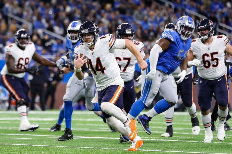 Bearsov branilec Andy Dalton se v četrtek v četrti četrtini bori za prvi poraz proti Lionsom.
