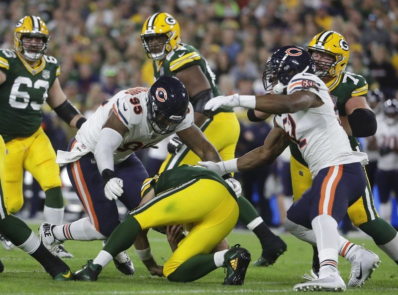 Der Quarterback der Green Bay Packers, Aaron Rodgers, ist verletzt, nachdem er in der ersten Hälfte eines NFL-Footballspiels gegen die Chicago Bears am Sonntag, den 9. September 2018, in Green Bay, Wisconsin, entlassen wurde | AP Foto/Morry Gash