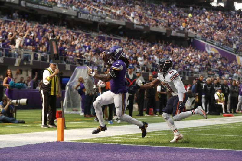  Et bilde av Vikings løpende Dalvin Cook som løper for en touchdown mot Bears på søndag.
