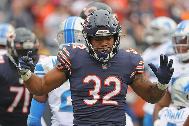 David Montgomery celebra después de correr por un touchdown contra los Lions en octubre.