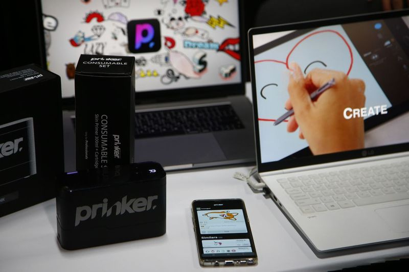 Prinker Korea pronkt met hun tijdelijke tattoo-printer en app op het CES Unveiled media preview-evenement, zondag 5 januari 2020, in Las Vegas.