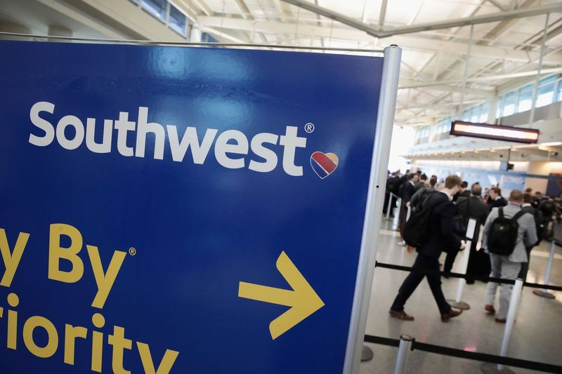 „Southwest Airlines“ keleiviai registruojasi skrydžiams Midway oro uoste 2018 m. sausio mėn.