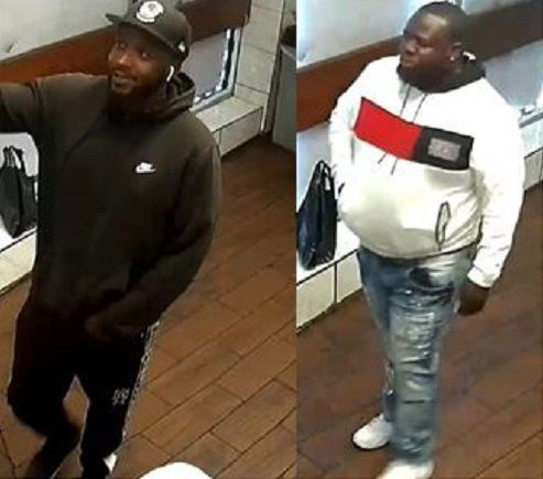 Polisen säger att dessa övervakningsbilder visar två män eftersökta för ett rån 13 september 2020 i kvarteret 300 på North Laramie Avenue.