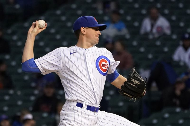 Le lanceur partant des Cubs, Kyle Hendricks, livre lors de la première manche du match de mercredi contre les Twins.