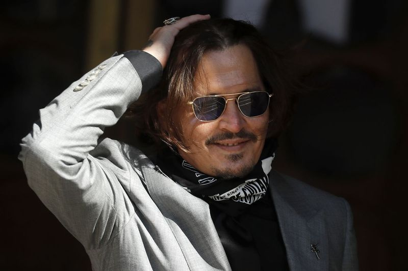 Acteur Johnny Depp arriveert in juli bij het Hooggerechtshof in Londen tijdens zijn zaak tegen News Group Newspapers vanwege een gepubliceerd verhaal over zijn voormalige vrouw Amber Heard, die hem een ​​vrouwenklopper noemde.