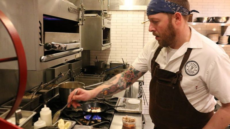 Chef Mark Steuer mengetuai dapur di restoran Funkenhausen. | Brian Rich / Sun-Times