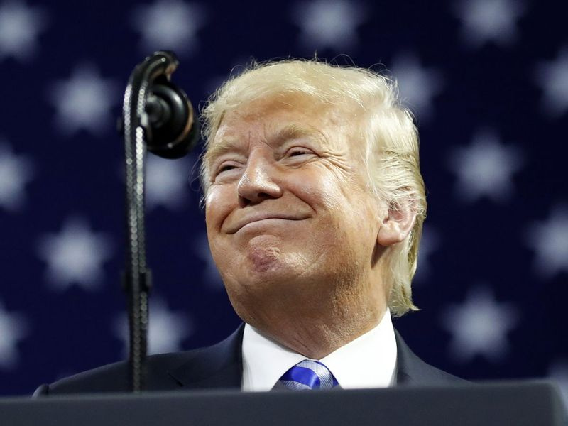 Presiden Donald Trump pada perhimpunan 24 Ogos di Charleston, Virginia Barat. | Alex Brandon/AP