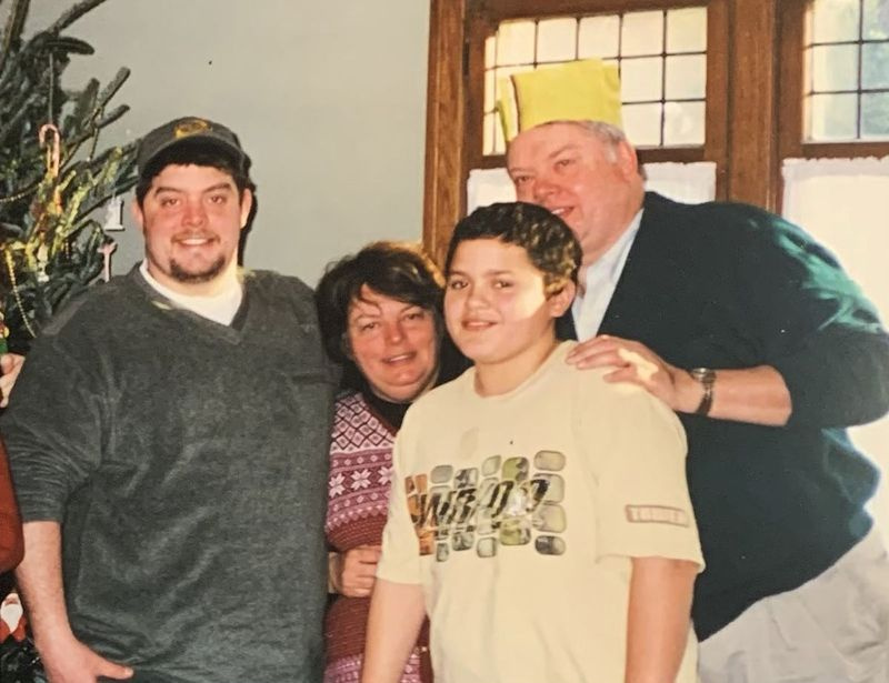 Jan og David Brent med deres sønner Patrick (til venstre) og Casey (forgrund).
