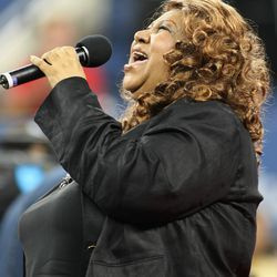 Aretha Franklin membuat persembahan semasa upacara 2007 menghormati mendiang pemain tenis Althea Gibson di Terbuka AS. | AFP/Getty Images