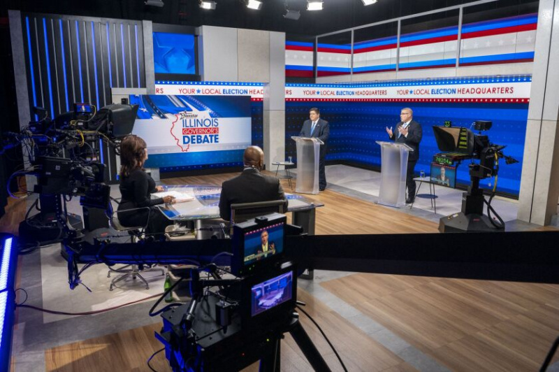   Zittende regeringsleider J.B. Pritzker en GOP-gouverneurskandidaat Daren Bailey nemen deel aan hun tweede en laatste debat in WGN Studios, dinsdag 18 oktober.