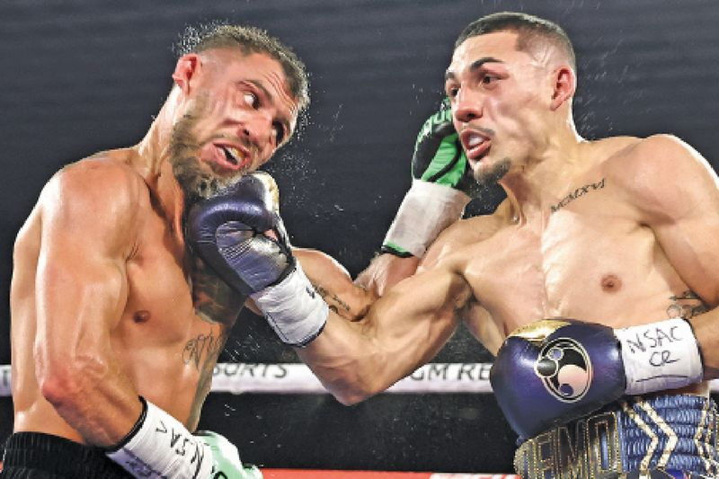 Vasiliy Lomachenko (links) en Teofimo Lopez