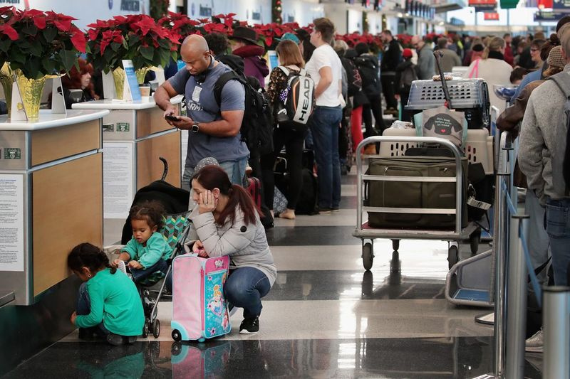 Passagiers proberen vluchten te halen vanaf O