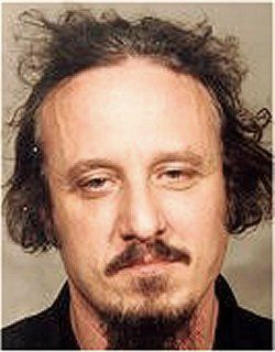Voormalig South Side Outlaws Motorcycle Club-baas Orville Cochran, getoond jaren voordat hij vluchtte in het licht van een federale aanklacht.
