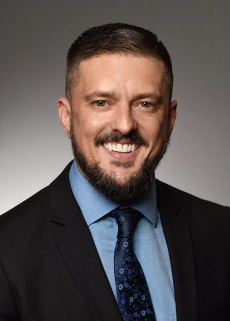 Headshot av Brent Adams, senior vice president för Woodstock Institute.